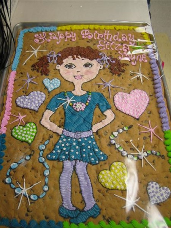 GIRL ON COOKIE CAKE